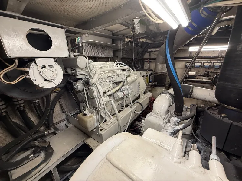 Slide: The Image of Engine room of a 1972 Burger 81 Raised Pilothouse yacht, showcasing mechanical components. - 24