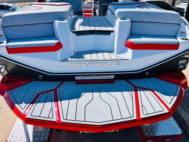 Slide: The Image of 2025 Nautique Super Air Nautique G23 boat with stylish seating and deck design. - 10