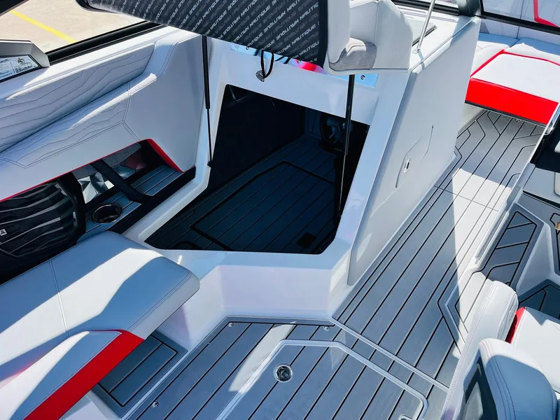Slide: The Image of 2025 Nautique Super Air Nautique G23 interior with sleek seating and modern design. - 25