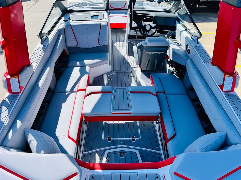 Slide: The Image of 2025 Nautique Super Air Nautique G23 interior with sleek seating and modern design. - 38