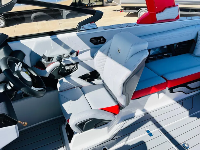 Slide: The Image of 2025 Nautique Super Air Nautique G23 interior with modern seating and sleek design. - 45