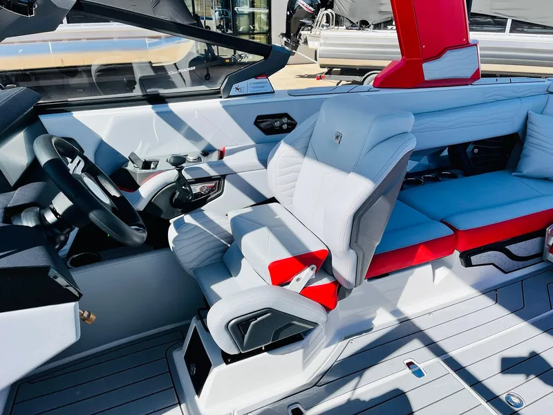 Slide: The Image of 2025 Nautique Super Air Nautique G23 interior with modern seating and sleek design. - 46