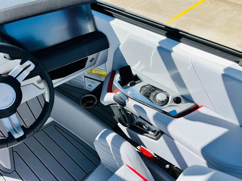 Slide: The Image of 2025 Nautique Super Air Nautique G23 cockpit with modern controls and sleek design. - 47