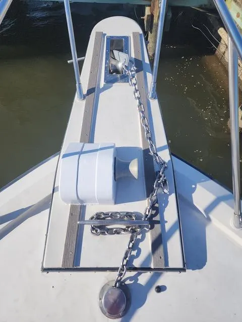 Slide: The Image of 1988 President 37 Sundeck yacht helm with Garmin navigation, docked at marina. - 20