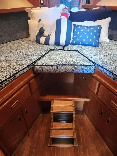 Slide: The Image of Interior of 1988 President 37 Sundeck with decor and framed photos. - 42