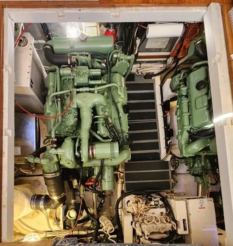 Slide: The Image of Cozy cabin interior of 1988 President 37 Sundeck yacht with wooden furnishings. - 49