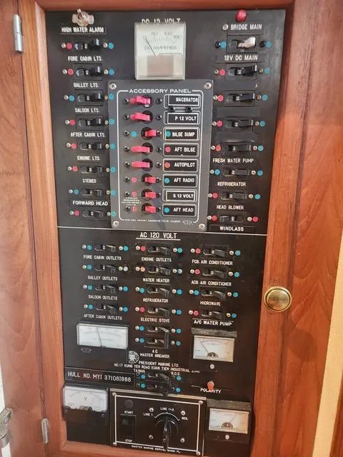 Slide: The Image of Electrical control panel on a 1988 President 37 Sundeck boat. - 61
