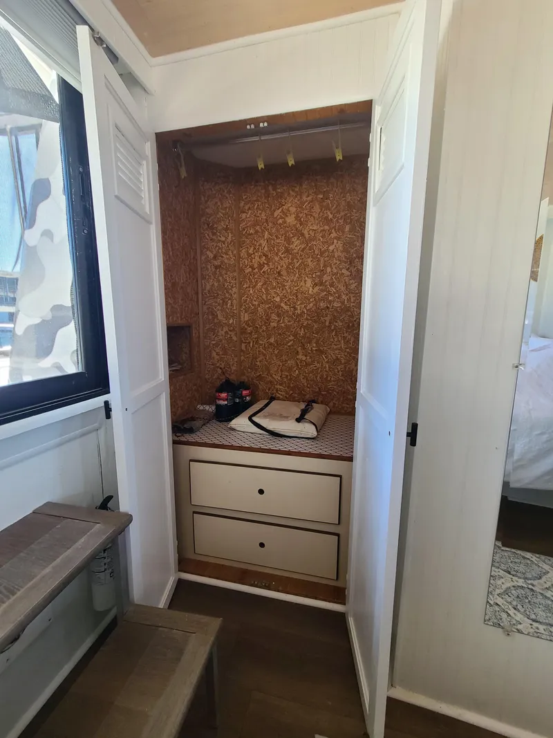 Slide: The Image of 1993 Gibson SPORT SERIES closet interior with drawers and hanging space. - 20