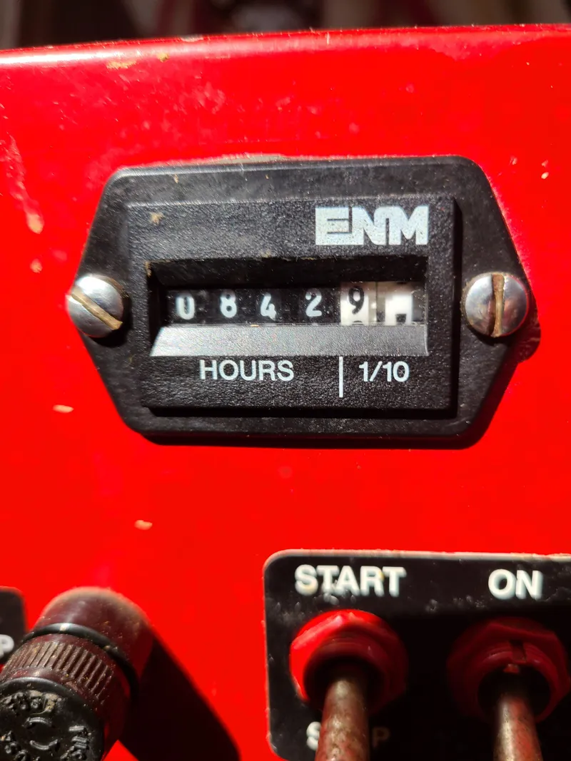 Slide: The Image of Close-up of a 1993 Gibson SPORT SERIES hour meter reading 8429.1 hours. - 29