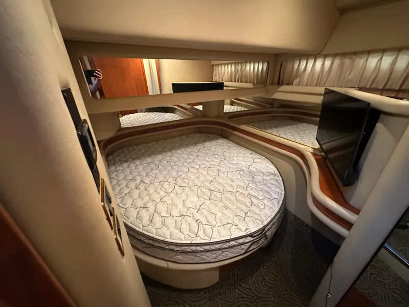 Slide: The Image of Luxurious bedroom interior of 2001 Sea Ray 480 Sedan Bridge yacht. - 18