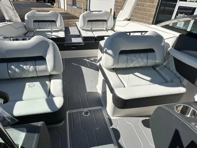 Slide: The Image of 2025 Regal LS4 Surf boat interior with luxurious seating and modern design. - 22