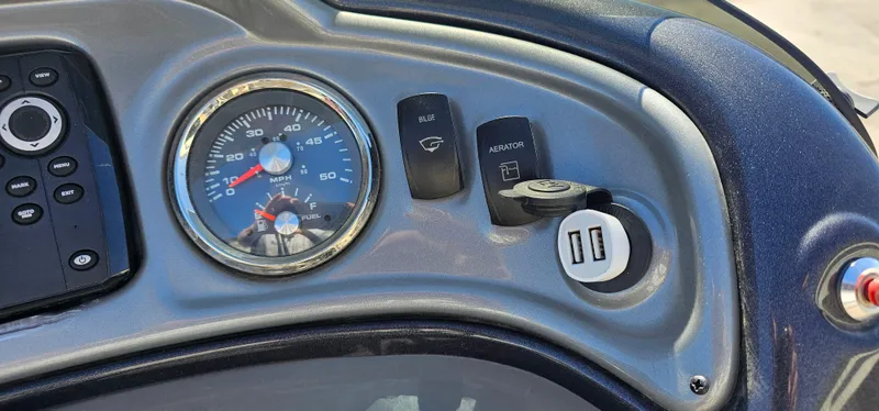 Slide: The Image of Dashboard of 2023 Sun Tracker SF-22XP3 with gauges and USB ports. - 15