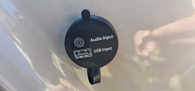 Slide: The Image of Audio and USB input ports on 2023 Sun Tracker SF-22XP3 boat. - 17