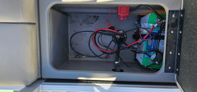 Slide: The Image of Battery compartment of 2023 Sun Tracker SF-22XP3 with wiring and components. - 25