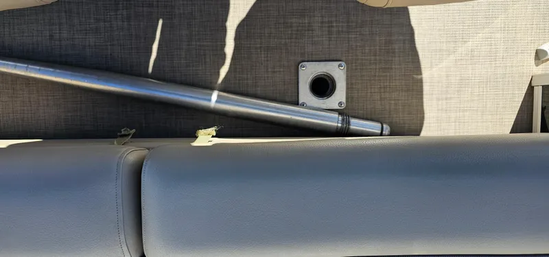 Slide: The Image of 2023 Sun Tracker SF-22XP3 boat interior with metal rod and seating. - 27