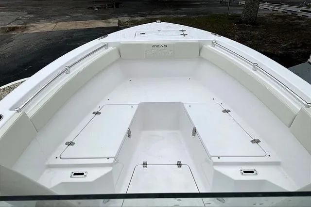 Slide: The Image of 2025 Aquasport 2200 Center Console boat, spacious deck, white finish, modern design. - 18