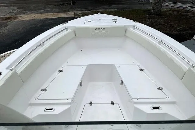 Slide: The Image of 2025 Aquasport 2200 Center Console boat, spacious deck view, white finish. - 38