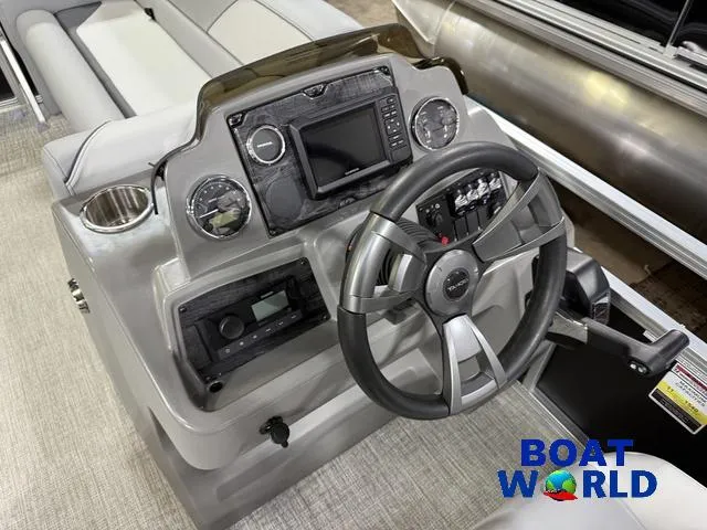 Slide: The Image of Steering console of 2025 Tahoe Sport 23' Fish & Cruise boat at Boat World. - 13