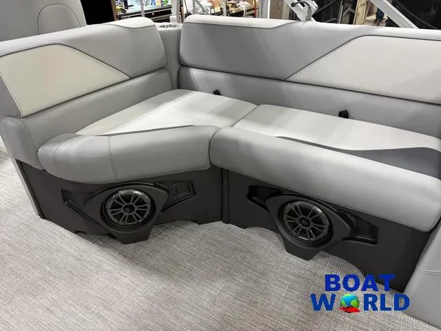 Slide: The Image of Luxurious seating in 2025 Tahoe Sport 23' Fish & Cruise boat with integrated speakers. - 25