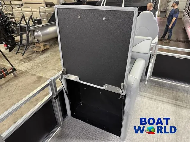 Slide: The Image of 2025 Tahoe Sport 23' Fish & Cruise boat interior with storage compartment open. - 28