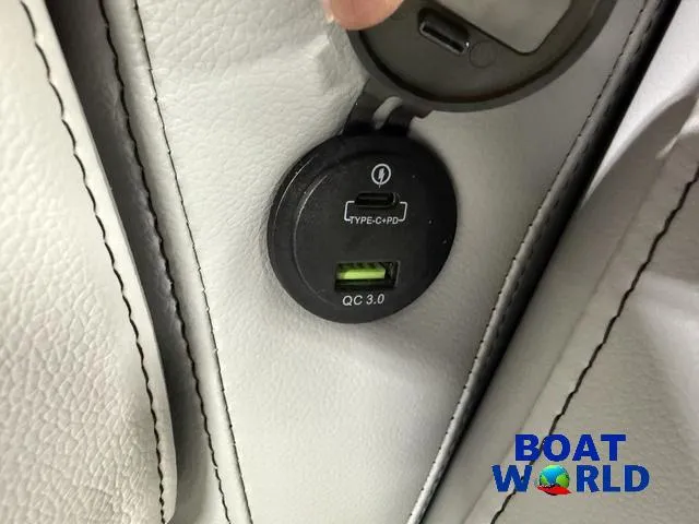 Slide: The Image of USB Type-C and QC 3.0 charging ports on 2025 Tahoe Sport 23' Fish & Cruise boat. - 30