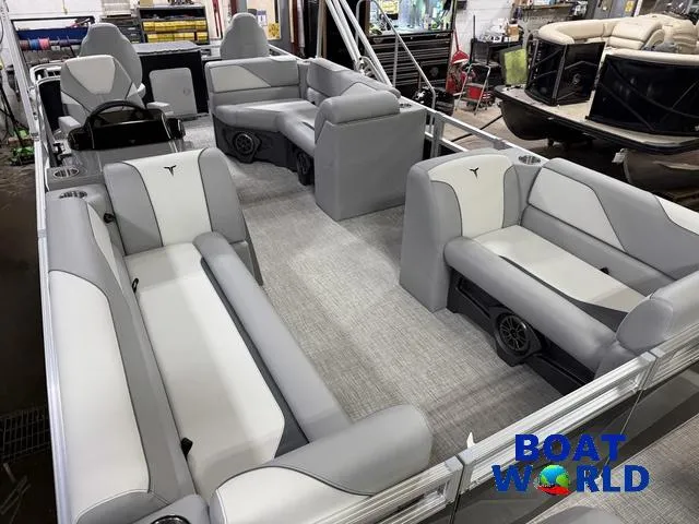 Slide: The Image of 2025 Tahoe Sport 23' Fish & Cruise boat interior with gray seating and spacious layout. - 32
