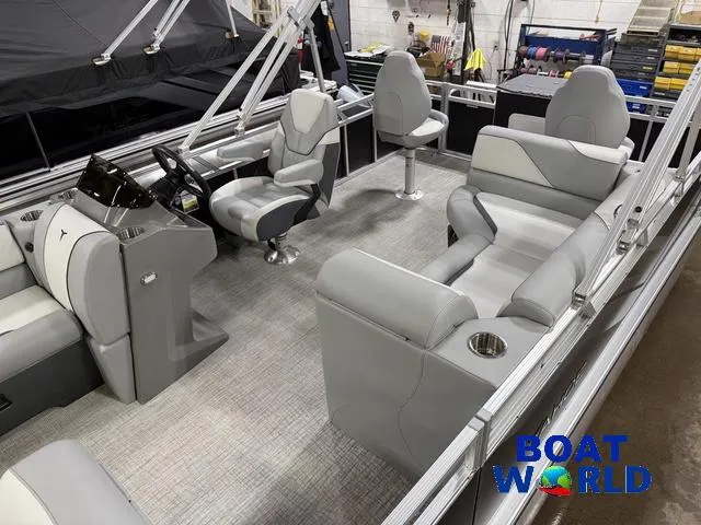 Slide: The Image of 2025 Tahoe Sport 23' Fish & Cruise interior with modern seating and controls. - 5