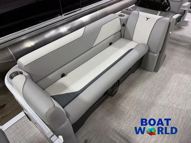 Slide: The Image of 2025 Tahoe Sport 23' Fish & Cruise boat interior with gray seating. - 9