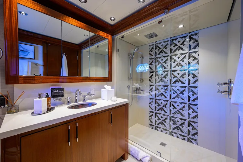 Slide: The Image of Luxurious bathroom in 2020 Westport Motor Yacht with modern fixtures and elegant design. - 25