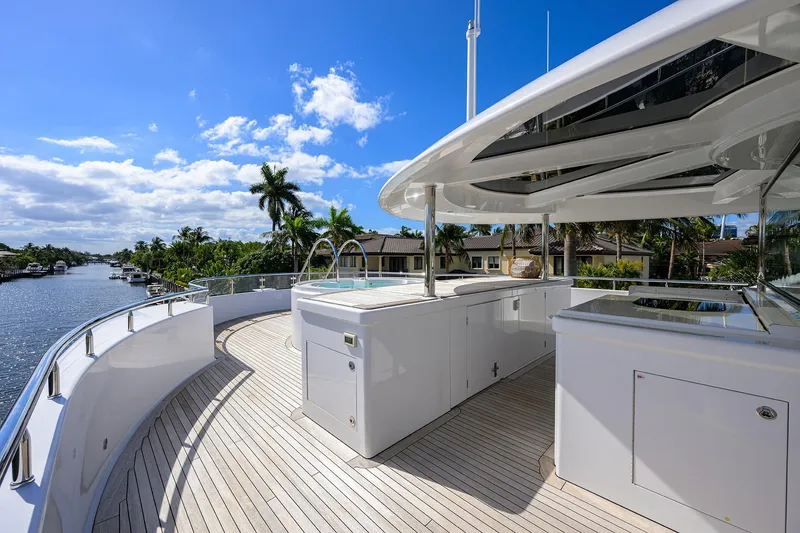 Slide: The Image of Luxurious 2020 Westport Motor Yacht deck with sleek design and waterfront view. - 49