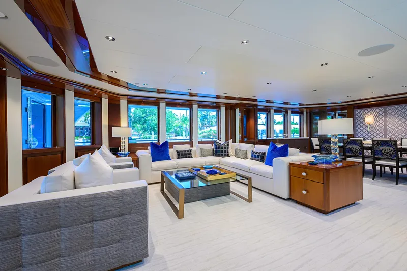 Slide: The Image of Luxurious interior of 2020 Westport Motor Yacht with elegant seating and large windows. - 6