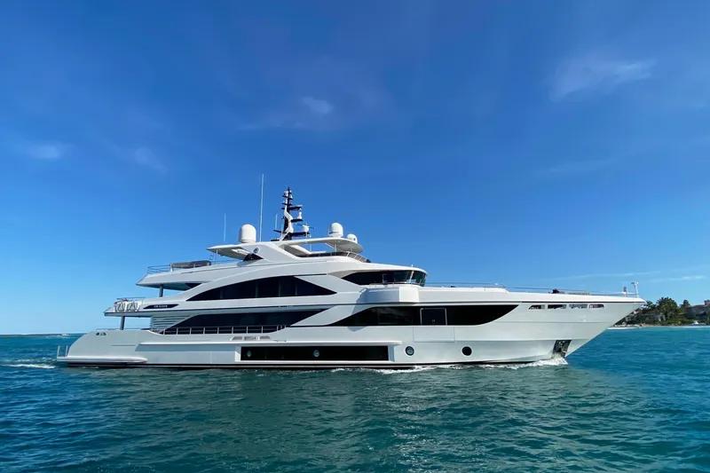 The Image of Luxurious 2020 Majesty motor yacht cruising on clear blue waters under a sunny sky. - 0