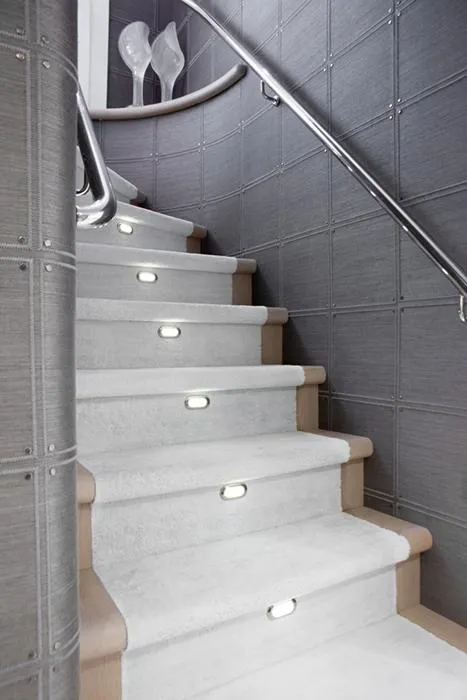 Slide: The Image of Modern staircase with sleek lighting, aboard a 2003 Westport 112 yacht. - 44