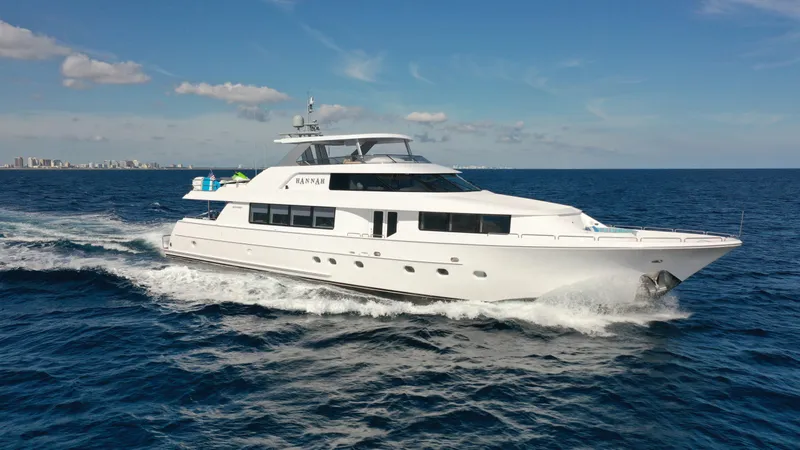 The Image of Luxury Westport 112 yacht cruising on open sea, clear skies, 2003 model. - 0