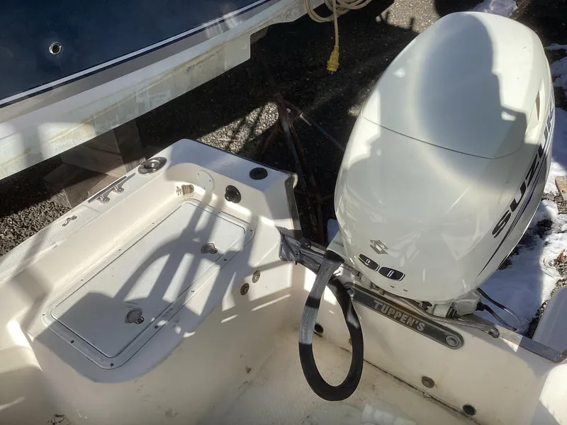 Slide: The Image of 2002 Key West 1720 boat with Suzuki outboard motor in sunlight. - 10
