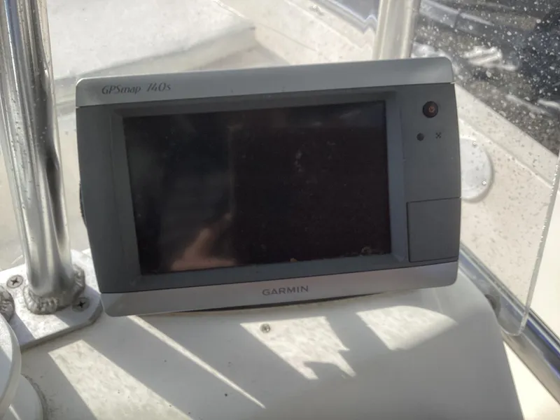 Slide: The Image of Garmin GPSmap 440s on 2002 Key West 1720 boat dashboard. - 13
