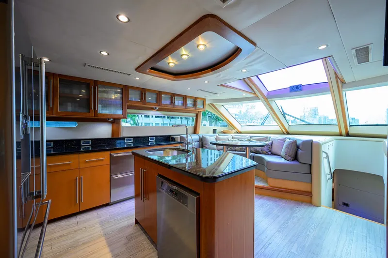 Slide: The Image of Luxurious interior of a 2008 Lazzara Motor Yacht with modern kitchen and seating area. - 10