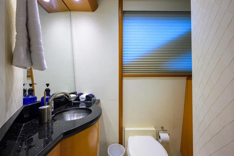 Slide: The Image of Luxurious bathroom in 2008 Lazzara Motor Yacht with modern fixtures and elegant design. - 16