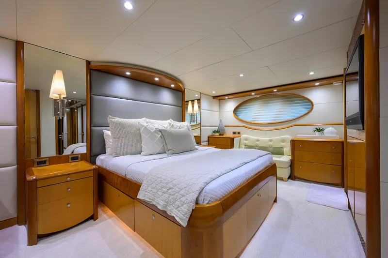 Slide: The Image of Luxurious bedroom interior of a 2008 Lazzara Motor Yacht with elegant furnishings. - 17