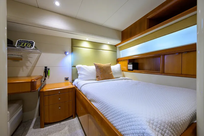 Slide: The Image of Luxurious bedroom interior of 2008 Lazzara Motor Yacht with modern furnishings and ambient lighting. - 29