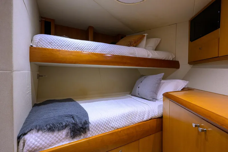 Slide: The Image of Cozy cabin with bunk beds in 2008 Lazzara Motor Yacht. - 32