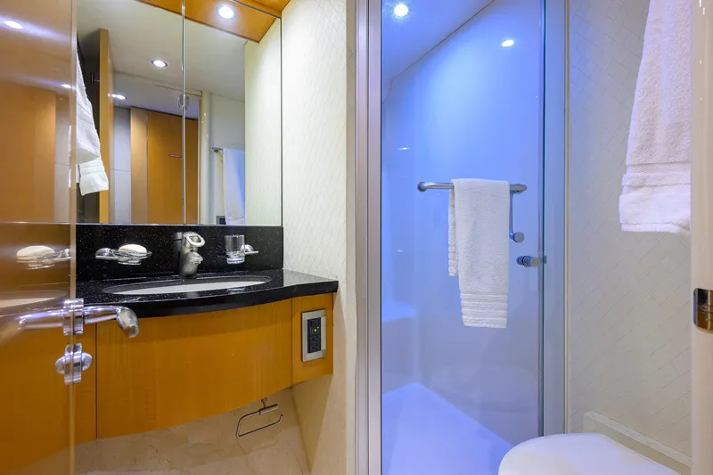 Slide: The Image of Luxurious bathroom in 2008 Lazzara Motor Yacht with modern fixtures and glass shower. - 33