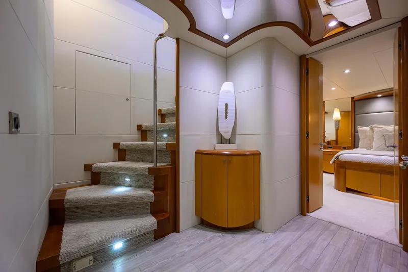 Slide: The Image of Luxurious interior of 2008 Lazzara Motor Yacht with elegant staircase and modern design. - 35