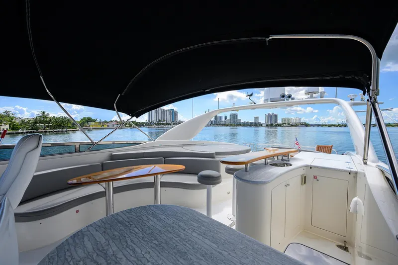 Slide: The Image of Luxurious 2008 Lazzara Motor Yacht interior with sleek seating and waterfront view. - 41