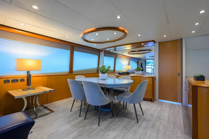 Slide: The Image of Luxurious interior of 2008 Lazzara Motor Yacht with elegant dining area and modern decor. - 8