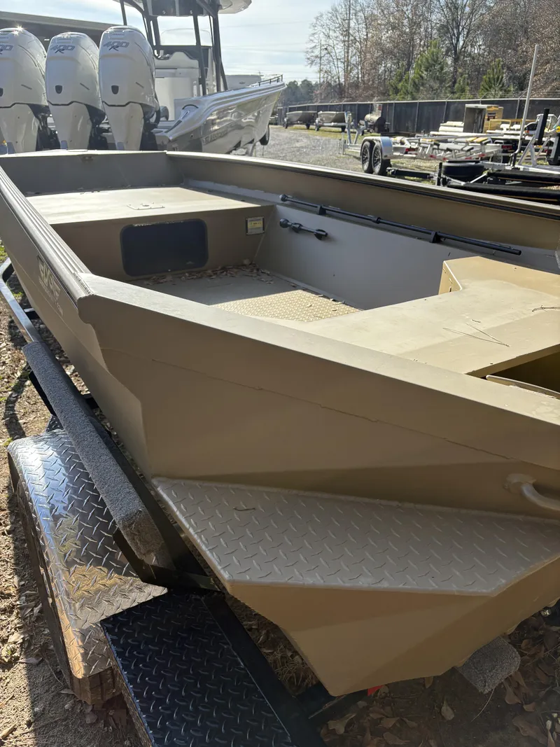 Slide: The Image of 2025 Edge Duck Boats 656 DB Sportsman on trailer, outdoor setting. - 3