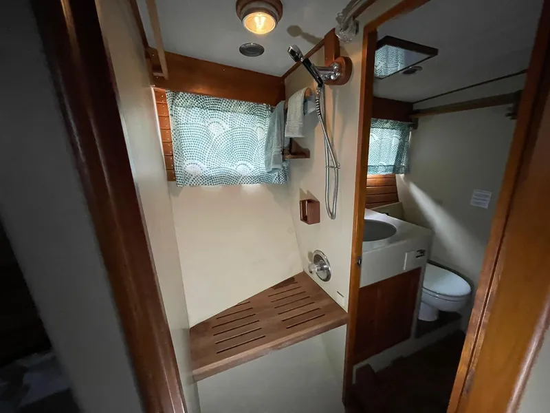 Slide: The Image of Bathroom interior of 1972 Grand Banks Alaskan 55 yacht with shower and sink. - 33