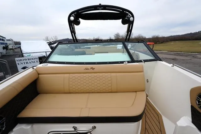 Slide: The Image of 2021 Sea Ray SDX 250 boat with tan seating and sleek design. - 10