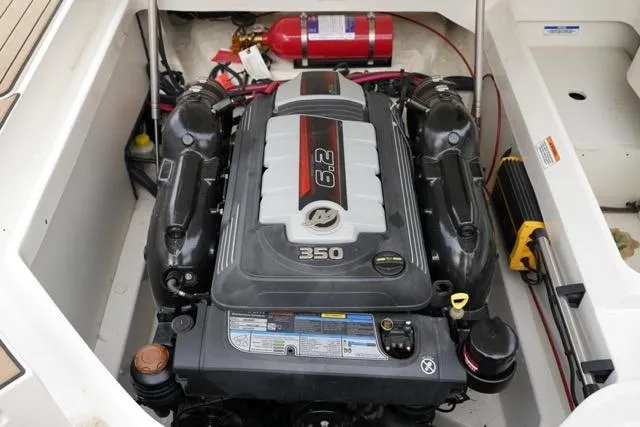 Slide: The Image of 2021 Sea Ray SDX 250 engine compartment with 6.2L 350 horsepower engine. - 17
