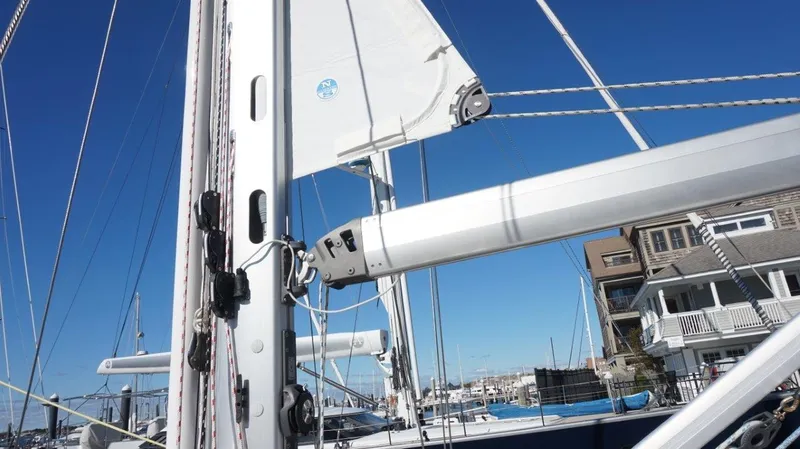 Slide: The Image of Sailboat mast and rigging of 2008 Oyster 46 against a clear blue sky. - 18